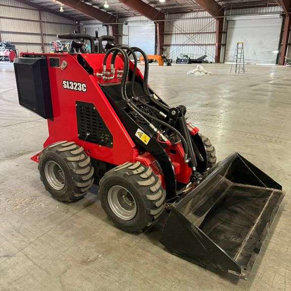 2025 SL323C Mini Skid Steer Loader (New/Unused) (Est. Retail Value $18,800). Includes Bucket and accepts multiple attachments