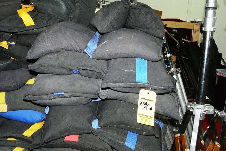 Lot (7) 25 Pound and (3) Assorted Sandbags in Crate