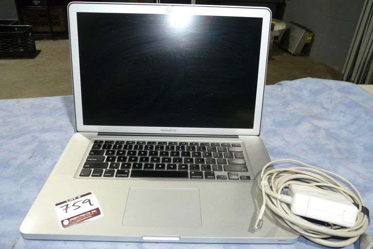 Apple A1286 MacBook Pro Laptop Computer with Power Supply