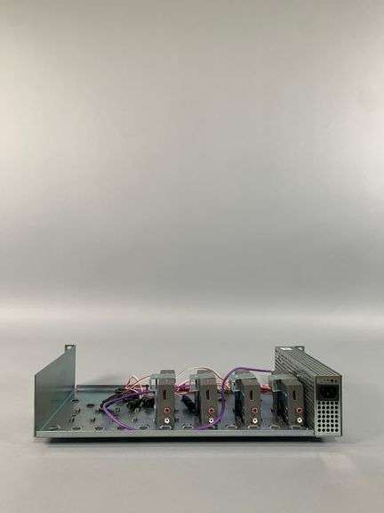 AJA Hi5-PLUS Comes with four Hi5-PLUS with a rack mount adapter and power supply on the rack. Also h