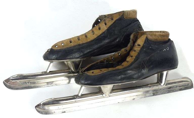 PAIR VINTAGE ICE SKATES