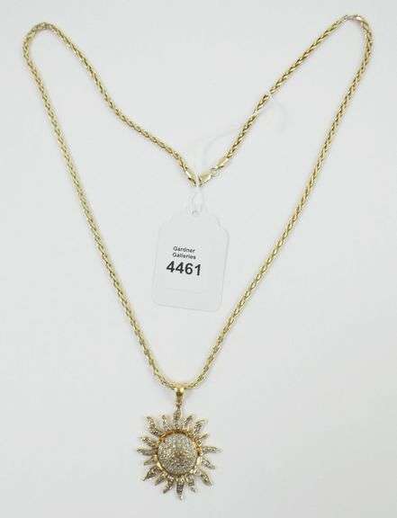 "SUN" PENDANT ON CHAIN