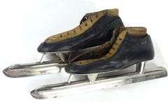 PAIR VINTAGE ICE SKATES