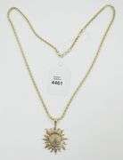 "SUN" PENDANT ON CHAIN