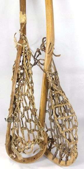 TWO LACROSSE STICKS