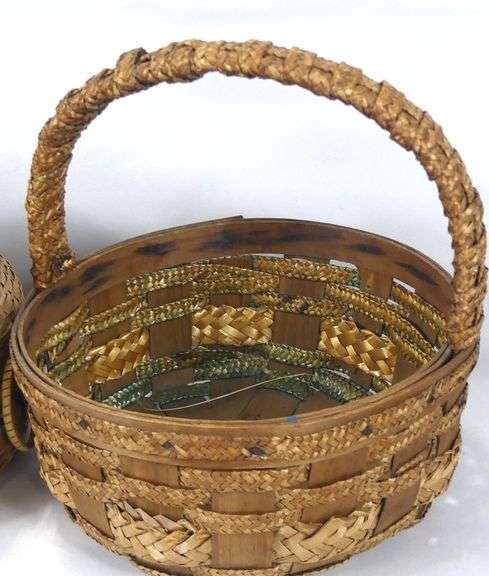 TWO WOVEN BASKETS