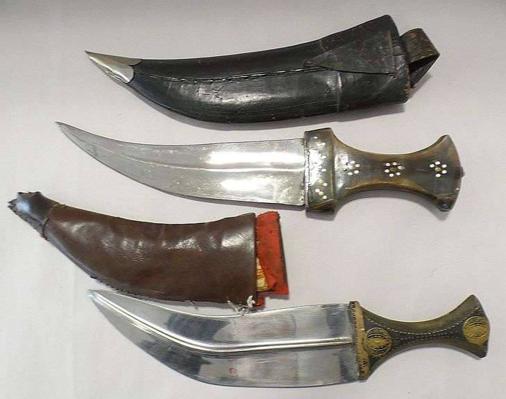 TWO MIDDLE EASTERN KUKRIS