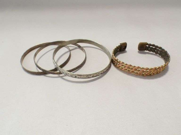 SEVEN BRACELETS AND BROOCH