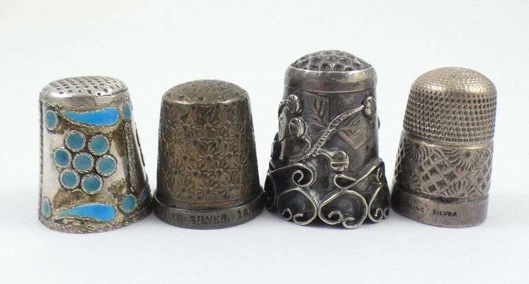 4 SILVER THIMBLES