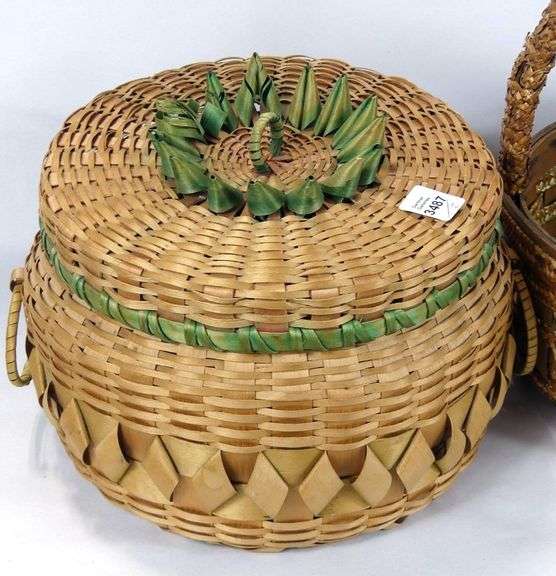 TWO WOVEN BASKETS