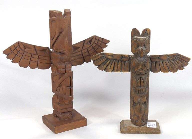 TWO CARVED TOTEM POLES