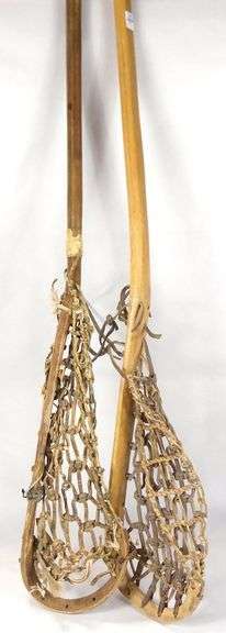TWO LACROSSE STICKS