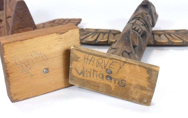 TWO CARVED TOTEM POLES