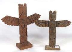 TWO CARVED TOTEM POLES