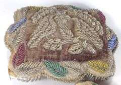 TWO IROQUOIS BEADED PINCUSHIONS