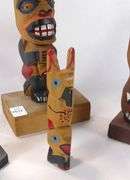 CARVED TOTEM POLES