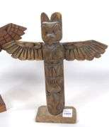 TWO CARVED TOTEM POLES