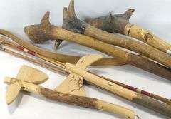 CARVED WOODEN CLUBS, BOW & ARROWS, ETC.