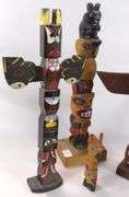 CARVED TOTEM POLES