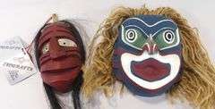 TWO CARVED MASKS