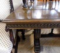 NINE-PIECE OAK DINING SET