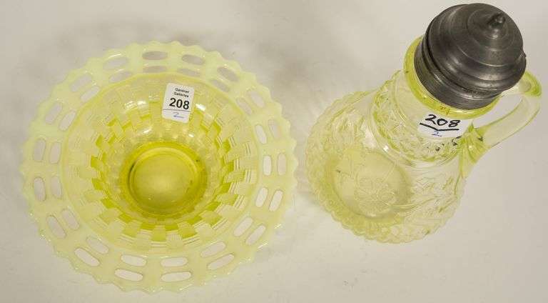 TWO PIECES OF VASELINE GLASS