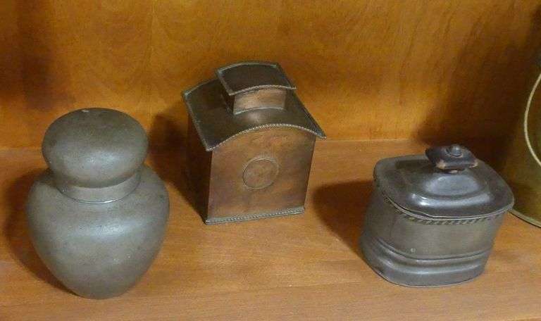 FOUR ANTIQUE METAL TEA CADDIES