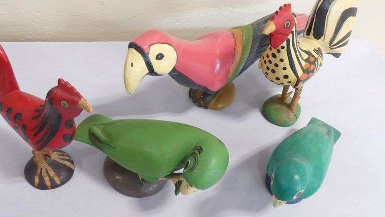 FIVE WOODEN "BIRD" CARVINGS