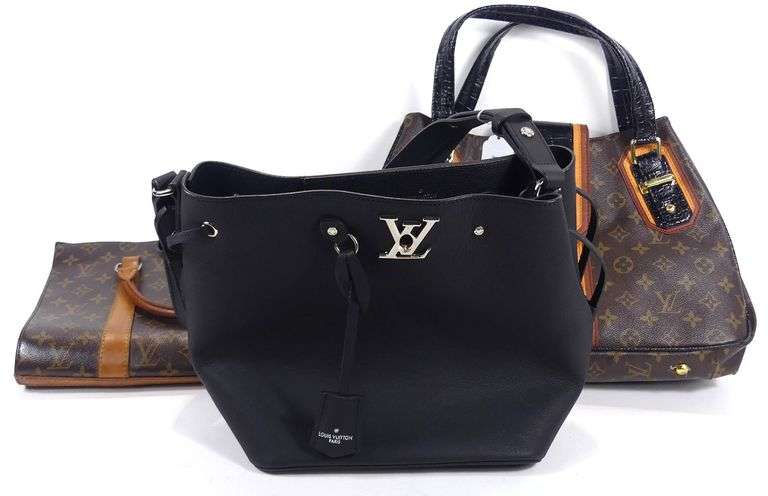 THREE LEATHER PURSES