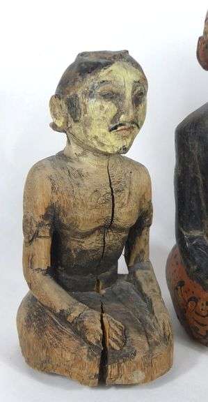 FOUR EARLY ASIAN CARVINGS