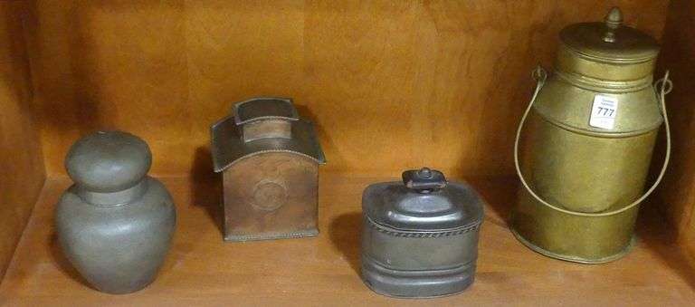 FOUR ANTIQUE METAL TEA CADDIES