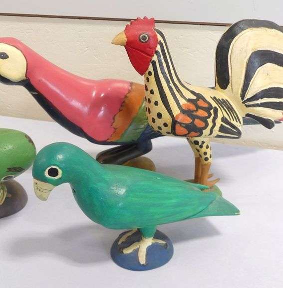 FIVE WOODEN "BIRD" CARVINGS