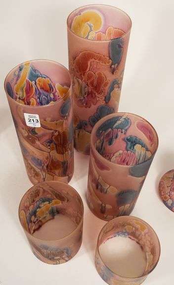 FIVE PIECE GRADUATED ART GLASS JAR SET