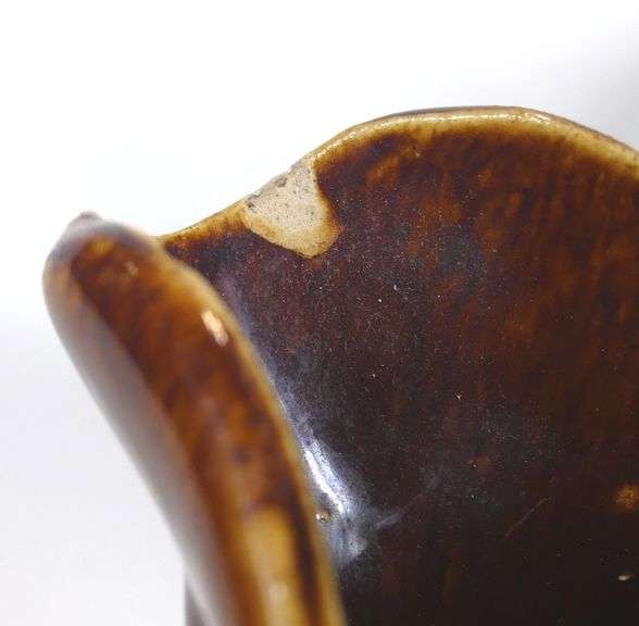 FOUR ANTIQUE STONEWARE PITCHERS