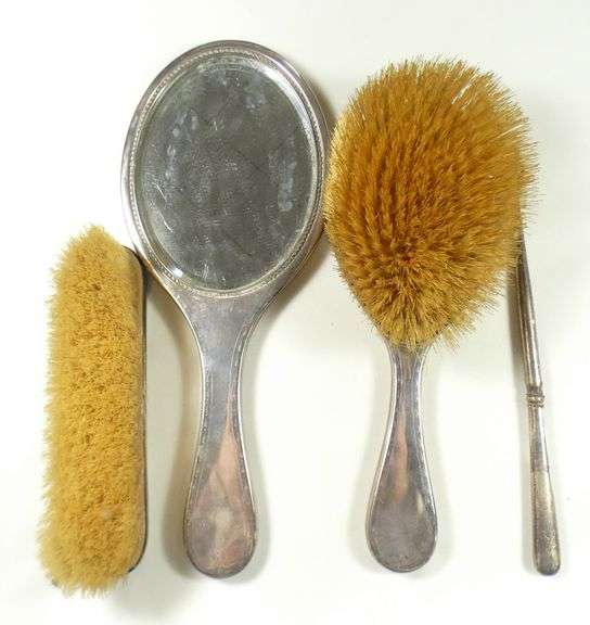 FOUR-PIECE STERLING TOILETTE SET