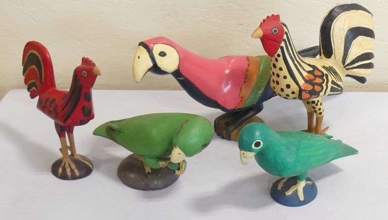 FIVE WOODEN "BIRD" CARVINGS