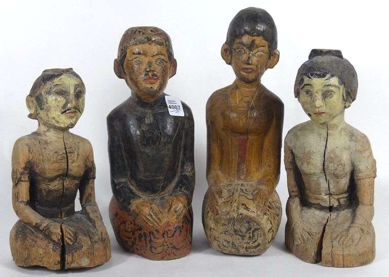 FOUR EARLY ASIAN CARVINGS