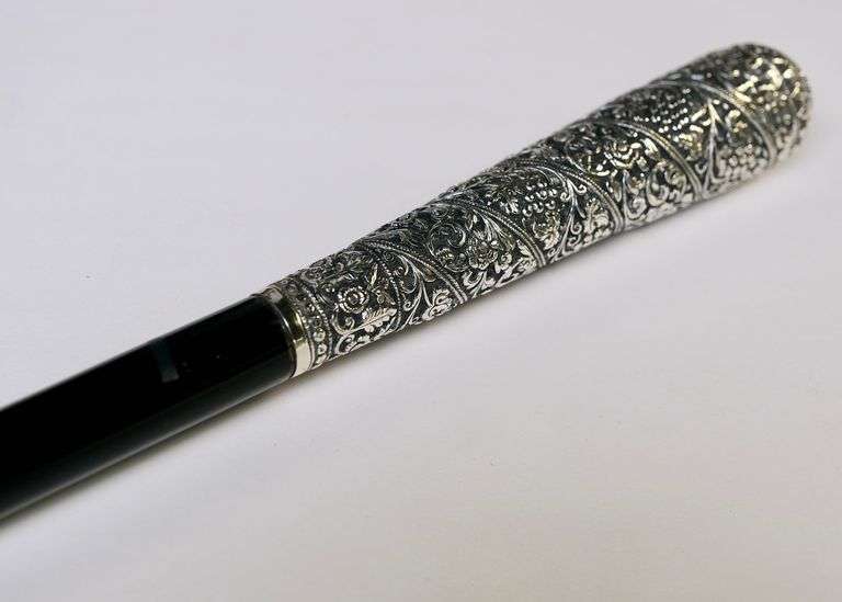 SILVER HANDLED WALKING CANE