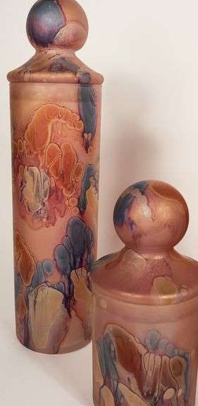 FIVE PIECE GRADUATED ART GLASS JAR SET