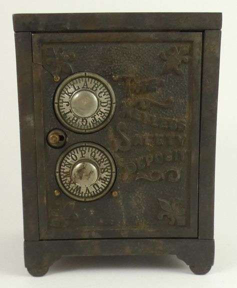 ANTIQUE CAST IRON COIN BANK