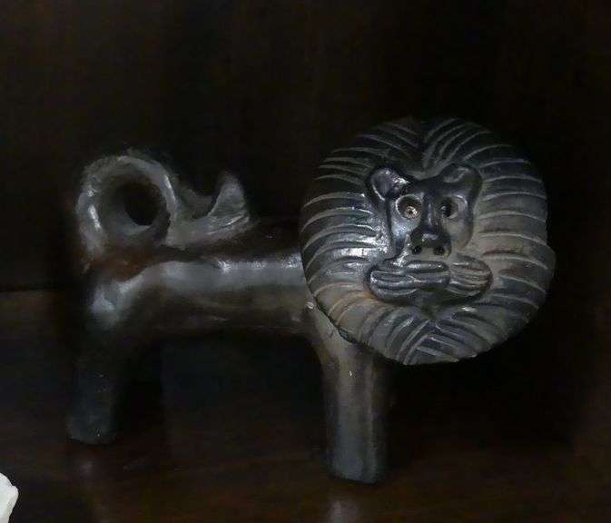 TWO POTTERY FIGURINES AND METAL SCULPTURE