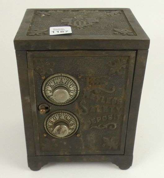 ANTIQUE CAST IRON COIN BANK