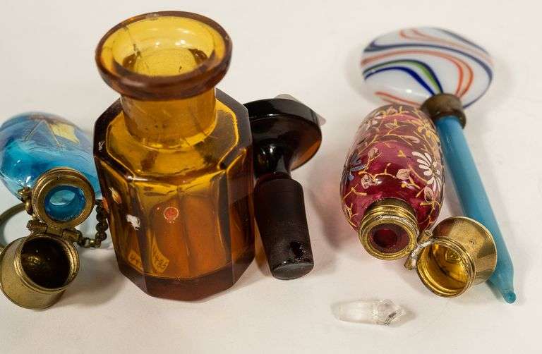 THREE SCENT BOTTLES AND DABBER