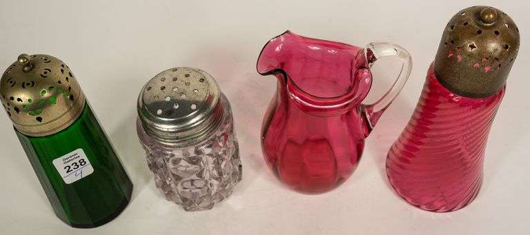 THREE SUGAR CASTERS AND CREAMER