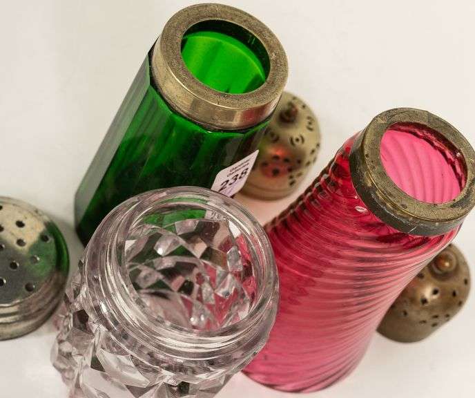 THREE SUGAR CASTERS AND CREAMER