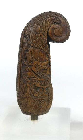 PAIR CARVED WOODEN HILTS