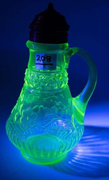 TWO PIECES OF VASELINE GLASS