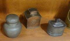 FOUR ANTIQUE METAL TEA CADDIES
