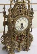ELABORATE BRASS MANTEL CLOCK