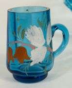 FOUR PIECES OF BLUE GLASS